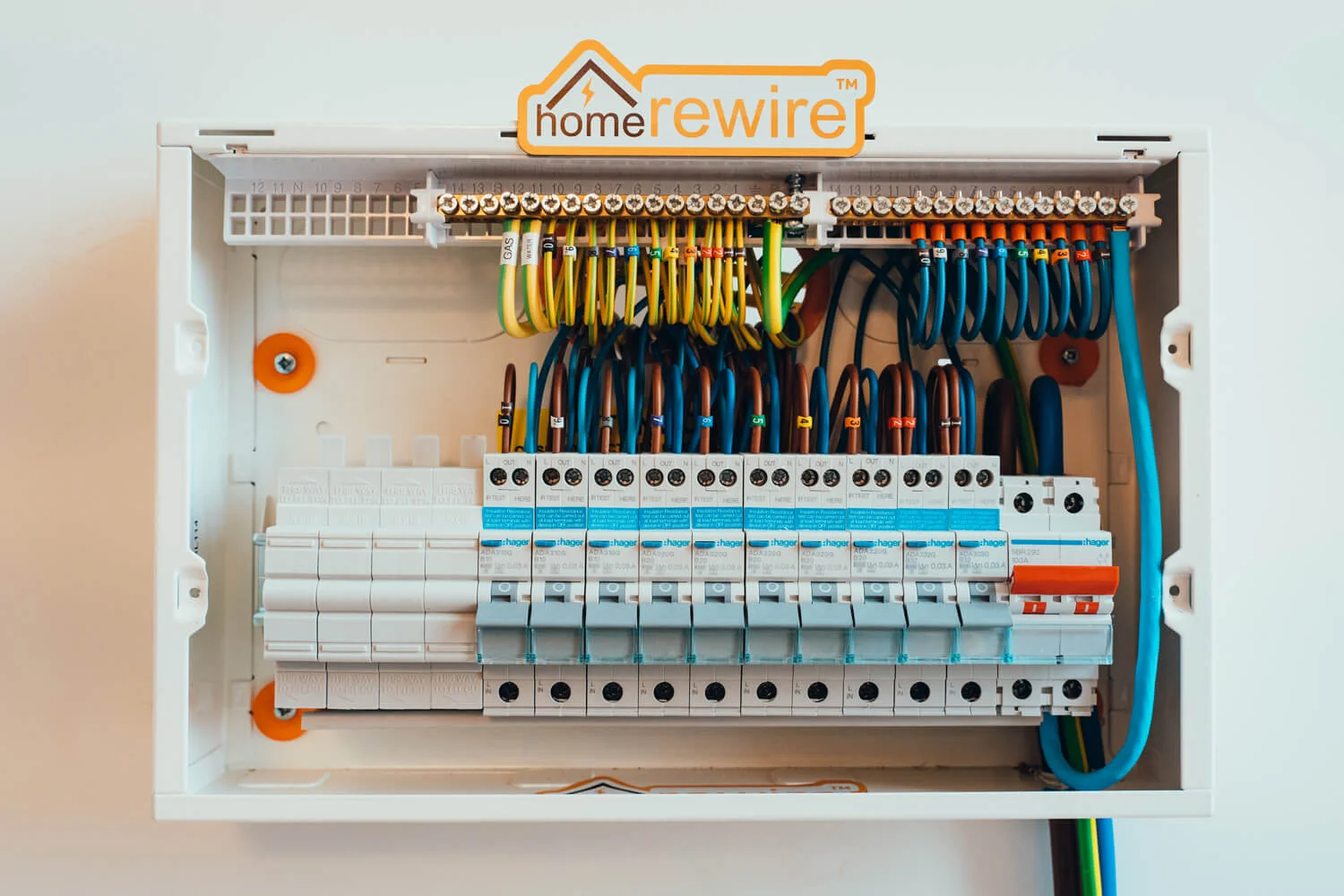 New cable routed through a joist during a house rewire